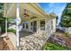 Covered back patio features a ceiling fan and views of the backyard at 7870 Sunflower Green # 151, Frederick, CO 80530