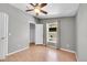 Comfortable bedroom features hardwood floors, ceiling fan, window, and closet at 7870 Sunflower Green # 151, Frederick, CO 80530