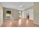 Bright, spacious bedroom with hardwood floors and natural light from two windows at 7870 Sunflower Green # 151, Frederick, CO 80530