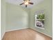 Bedroom with natural light features hardwood floors, ceiling fan, and window at 7870 Sunflower Green # 151, Frederick, CO 80530