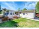 Charming single-story home showcasing a manicured lawn and a classic white picket fence at 7870 Sunflower Green # 151, Frederick, CO 80530