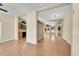 Open concept living room with hardwood floors and lots of natural light at 7870 Sunflower Green # 151, Frederick, CO 80530