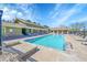 Community pool and lounge area with plenty of seating for residents to enjoy at 7870 Sunflower Green # 151, Frederick, CO 80530