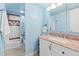 Bathroom featuring vanity, updated shower, and bright interior paint at 4801 E 9Th Ave # 209S, Denver, CO 80220