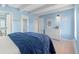 Cozy bedroom with a queen bed, ample closet space and hardwood floors at 4801 E 9Th Ave # 209S, Denver, CO 80220