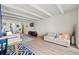Bright living room features modern furniture, hardwood floors and plenty of space at 4801 E 9Th Ave # 209S, Denver, CO 80220