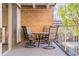 Patio featuring outdoor furniture and a view of greenery, creating a relaxing outdoor space at 4801 E 9Th Ave # 209S, Denver, CO 80220