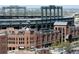 Iconic view of Coors Field featuring its classic brick facade and rooftop seating at 100 Dudley St, Lakewood, CO 80226