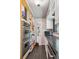 Well-organized pantry with custom shelving, stainless steel ovens, and ample storage space at 100 Dudley St, Lakewood, CO 80226