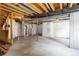Spacious unfinished basement ready for customization, equipped with utilities and white insulated walls at 22527 E Layton Cir, Aurora, CO 80015