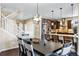 Open living space with combined kitchen and dining areas offering an airy, modern design at 22527 E Layton Cir, Aurora, CO 80015