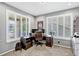 Bright office with ample natural light, neutral carpet, and a functional work space at 22527 E Layton Cir, Aurora, CO 80015