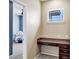 Office nook featuring a built-in desk with drawers and a window that provides natural light at 22527 E Layton Cir, Aurora, CO 80015