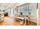 Bright dining area features a table with bench seating and a large window offering natural light at 5133 E Essex Ave, Castle Rock, CO 80104