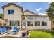 Backyard with patio and grill area, featuring ample sunlight from many windows at 5133 E Essex Ave, Castle Rock, CO 80104