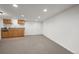 Basement space with a kitchenette and space for activities and storage at 708 Teal Cir, Longmont, CO 80503