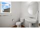 Bathroom featuring new fixtures, sink and toilet at 708 Teal Cir, Longmont, CO 80503
