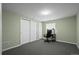 Bedroom with a large closet, workspace, carpet and neutral colored walls at 708 Teal Cir, Longmont, CO 80503