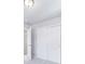 Carpeted bedroom featuring sliding-door closet and other room access at 46570 Avery Ln, Bennett, CO 80102