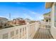 Overhead view of home's deck, overlooking the neighborhood's exteriors at 46570 Avery Ln, Bennett, CO 80102