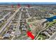 Desirable neighborhood location that showcases proximity to community, serene pond, and residential surroundings at 6216 E 135Th Ave, Thornton, CO 80602