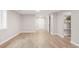 Finished basement with light wood floors, recessed lighting, and built-in shelves for extra storage at 117 S Pierce St, Lakewood, CO 80226