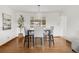 Modern dining area with stylish chairs and contemporary lighting creating a welcoming and functional space at 117 S Pierce St, Lakewood, CO 80226