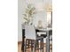 The stylish dining area features a modern table with sleek seating and contemporary lighting at 117 S Pierce St, Lakewood, CO 80226