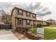 Exterior home view with tidy front yard, walkway, and 'For Sale' sign at 17882 E Wyoming Pl, Aurora, CO 80017