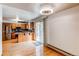 Bright kitchen featuring wooden cabinets, stainless steel refrigerator, and sliding door to the patio at 17882 E Wyoming Pl, Aurora, CO 80017