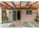 Cozy covered patio with patterned rugs and sliding door entry at 17882 E Wyoming Pl, Aurora, CO 80017