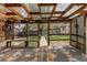 Spacious covered patio featuring bench seating and backyard views at 17882 E Wyoming Pl, Aurora, CO 80017