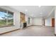 Large basement featuring a stone fireplace, recessed lighting, and multiple windows providing natural light at 3191 Bittersweet Ln, Evergreen, CO 80439
