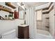 Stylish bathroom with a shower-tub combo and modern finishes at 1801 S Meade St, Denver, CO 80219