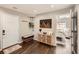 Inviting entryway leads to bedroom with stylish decor and hardwood flooring at 1801 S Meade St, Denver, CO 80219