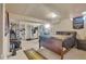 Cozy basement bedroom featuring natural light, closet space, and comfortable furnishings at 1177 Jamaica St, Aurora, CO 80010