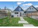 Well-maintained backyard featuring patio and lawn, perfect for outdoor activities at 3317 W 37Th Ave, Denver, CO 80211