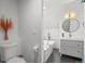 Modern bathroom featuring sleek fixtures, a freestanding tub, and stylish decor at 3317 W 37Th Ave, Denver, CO 80211