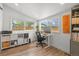 Well-lit home office with functional layout, modern desk, and ample storage with lots of light at 3317 W 37Th Ave, Denver, CO 80211