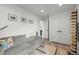 Comfortable living room with a gray sofa and stylish decor leading to the hallway at 3317 W 37Th Ave, Denver, CO 80211