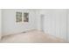 Bright bedroom with a large window and built in closet with shelving at 5485 S Jasper Ct, Centennial, CO 80015