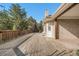 Spacious outdoor deck with wooden railing, offering ample space for outdoor entertaining at 5485 S Jasper Ct, Centennial, CO 80015