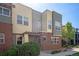 Townhome exterior showing varied textures like brick and siding, plus fresh landscaping at 11213 Colony Cir, Broomfield, CO 80021