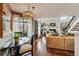 Open floor plan showcasing the dining area adjacent to the living room at 4878 E Kentucky Ave # B, Denver, CO 80246