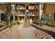 Well-maintained condo complex with communal stairs and landscaped surroundings offering a desirable living environment at 4878 E Kentucky Ave # B, Denver, CO 80246
