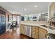 Bright kitchen with stainless steel appliances and open dining area view at 4878 E Kentucky Ave # B, Denver, CO 80246