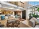Open living space with kitchen view, modern decor, and natural light at 4878 E Kentucky Ave # B, Denver, CO 80246