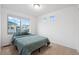 Bright and spacious bedroom featuring ample natural light and plush carpeting in a modern and comfortable home at 10152 Xanadu St, Commerce City, CO 80022