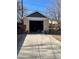 One car detached garage with an open door at 1453 Utica St, Denver, CO 80204