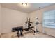 Bedroom with a weight bench, bar, and rack at 4724 S Wenatchee Cir, Aurora, CO 80015